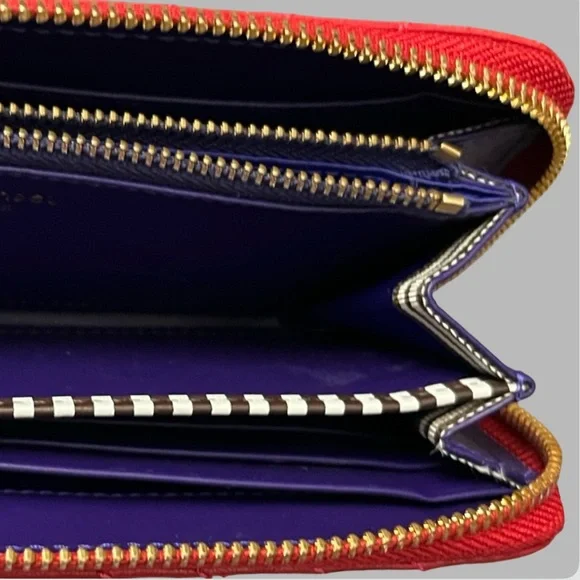 Henri Bendel red quilted wallet with a gold-tone logo. - Picture 16 of 16